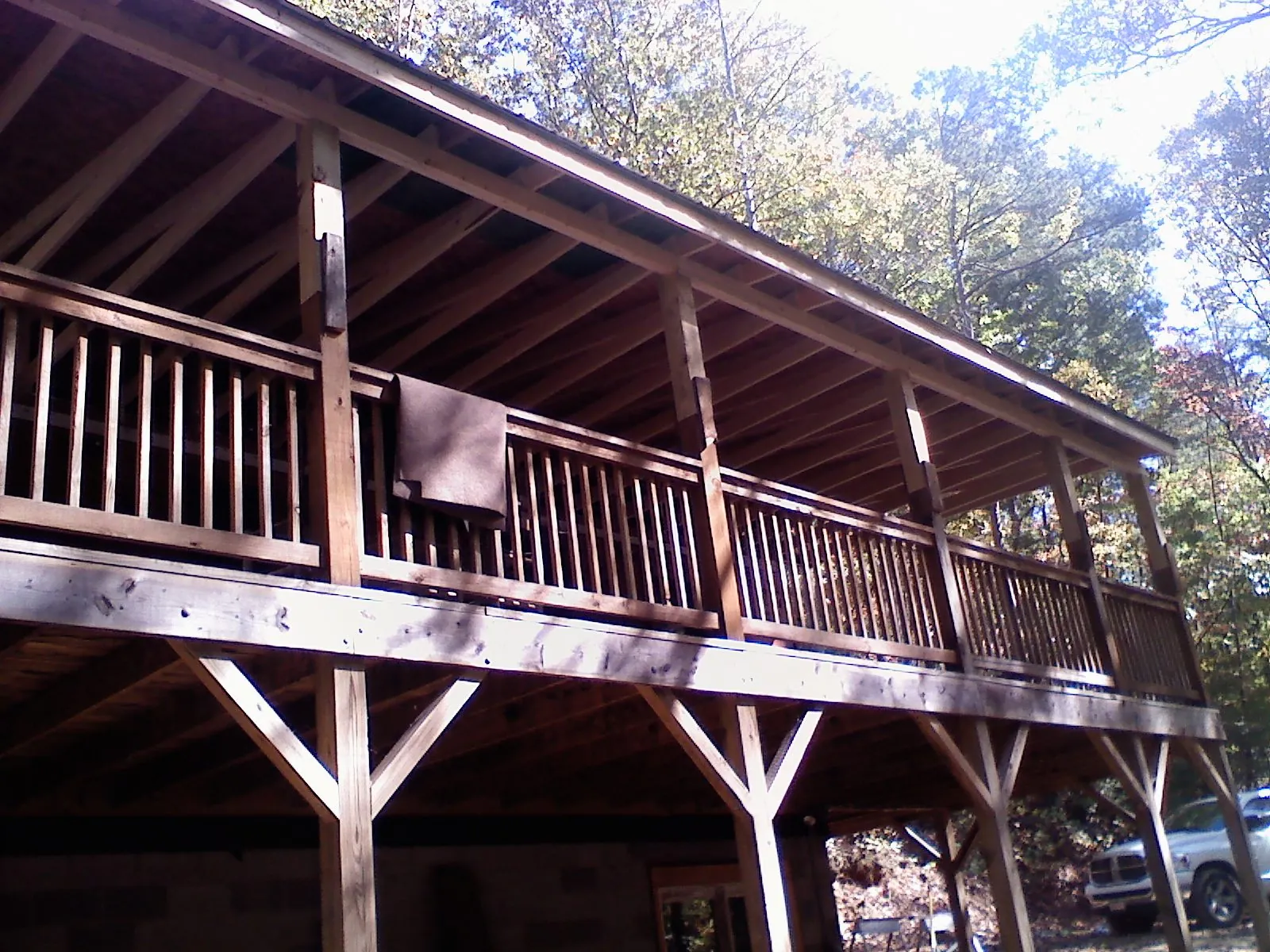 Timber framing under a new elevated porch and deck — Roof Leak Repair in Rose by Roofing Brothers